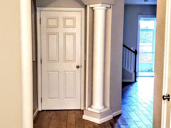 Beautiful entryway with tile floors throughout the downstairs and luxury vinyl plank upstairs.