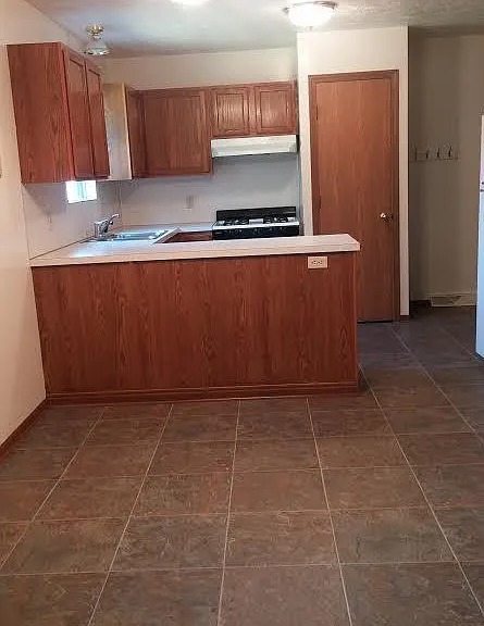partial view into dining and kitchen