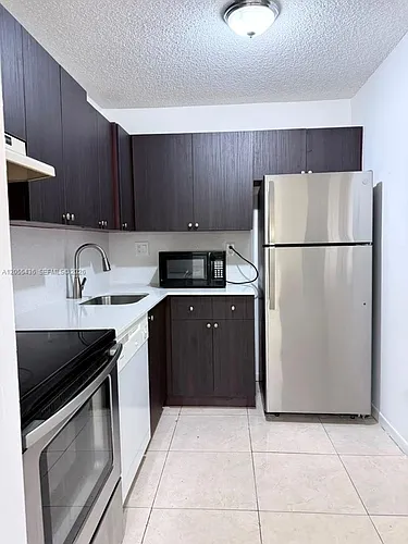 7090 NW 179th St #107 Photo 1