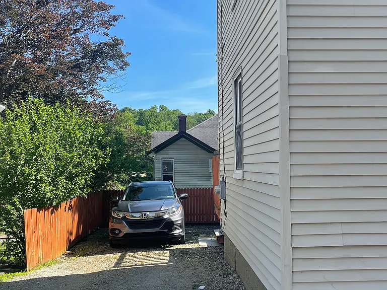 Private gravel parking, fits 2 vehicles.