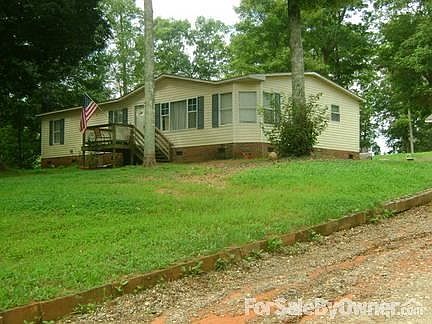 Lot 1 : 3 bedroom 2 bath, .55 acres, city water, on site septic tank system