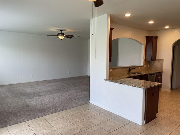 Open floorplan- kitchen open to dining + living room areas