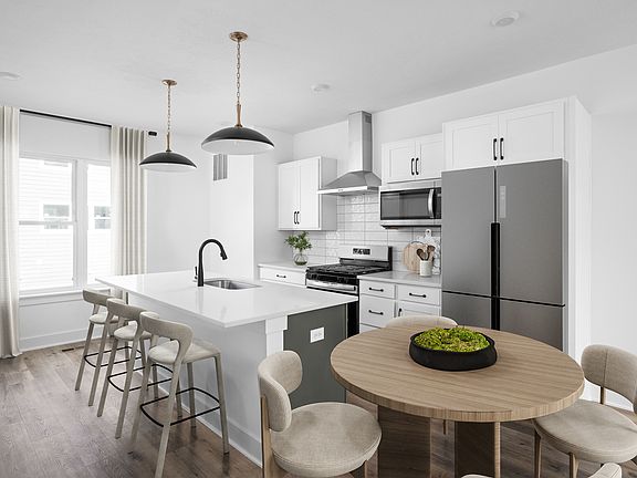 Kitchen w designer finishes and open floor plan