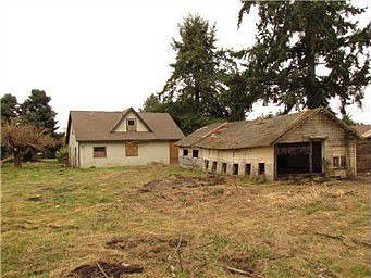 Back of garage & outbuilding