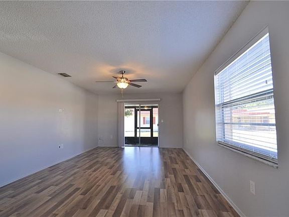 Living room...Lanai attached with sliding glass doors.