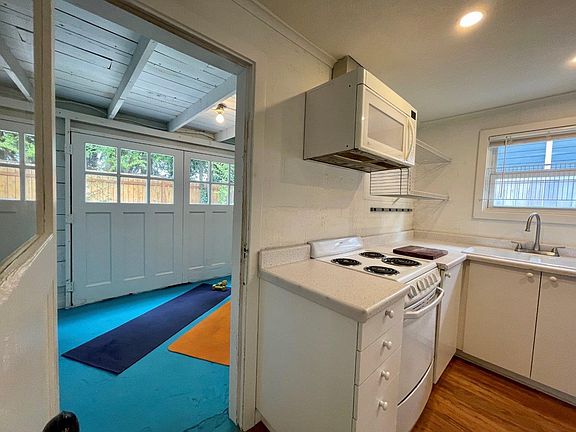 Kitchen looking to laundry room