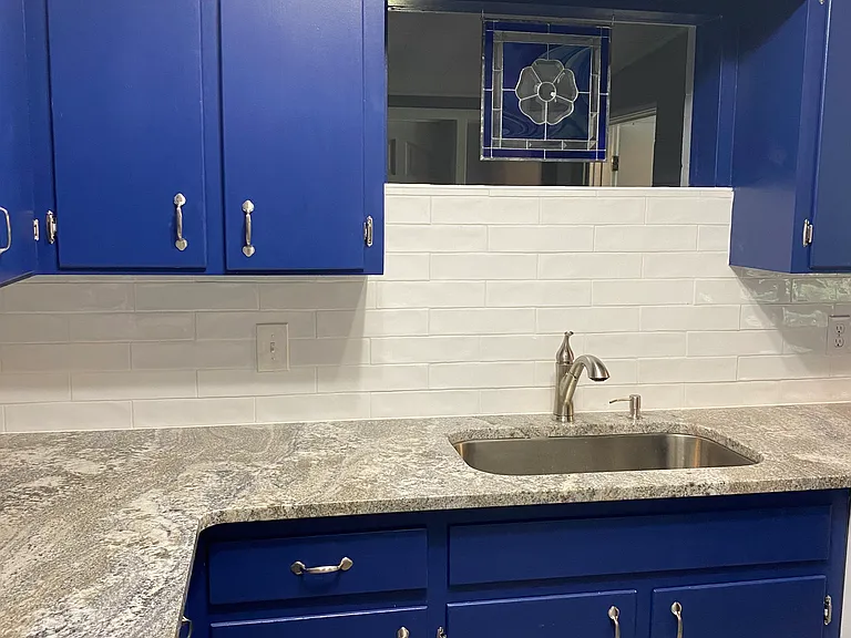 New quartz countertop, sink, faucet and dishwasher
