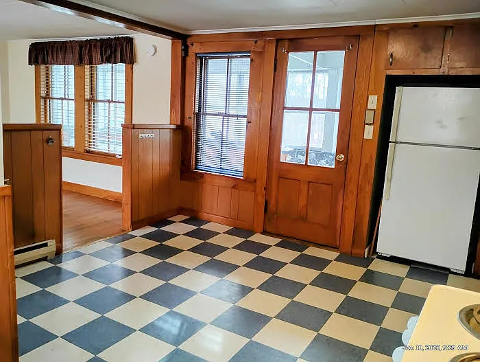 Lots of natural light. Enclosed porch insulates Kitchen & Living Room.