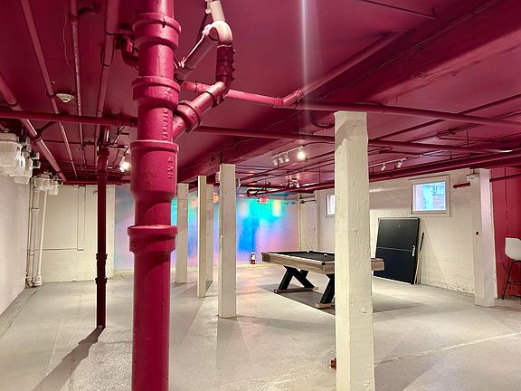 Basement rec area. Pool and pingpong table