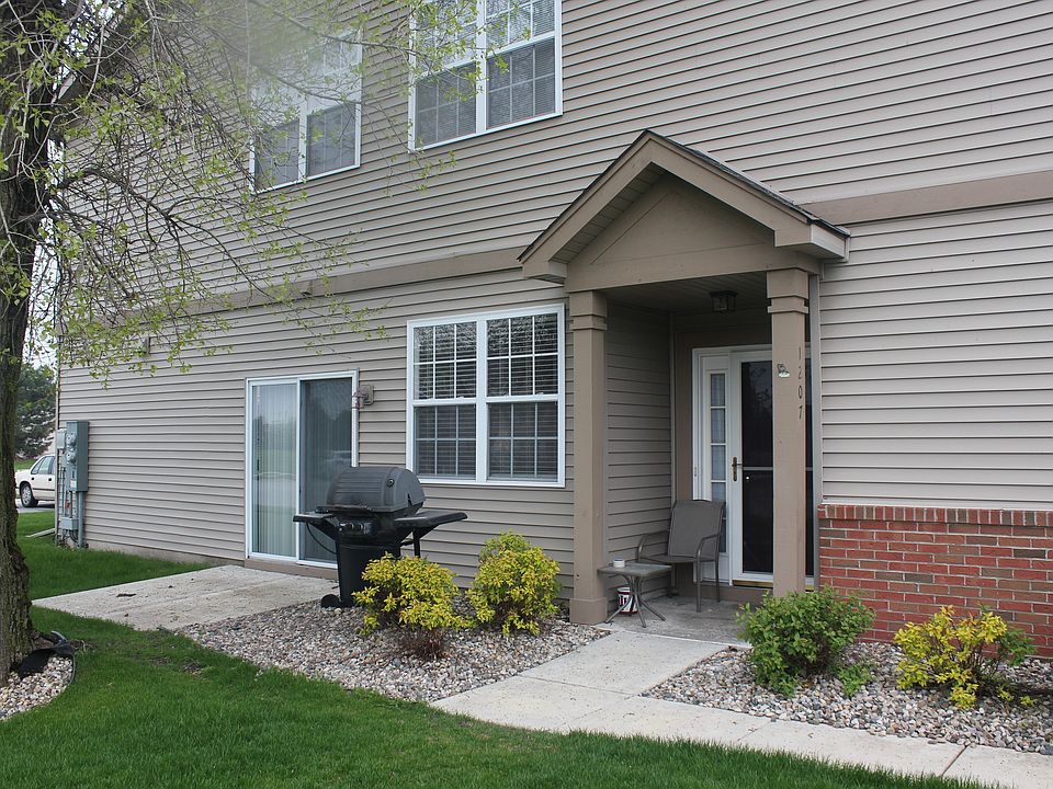 End unit with private patio and 1 private detached garage