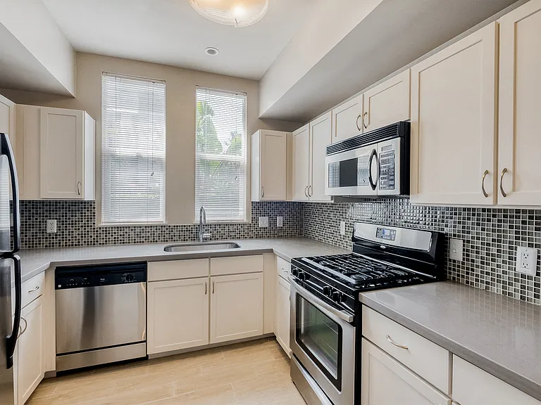 Modern kitchen with stainless steel appliances
