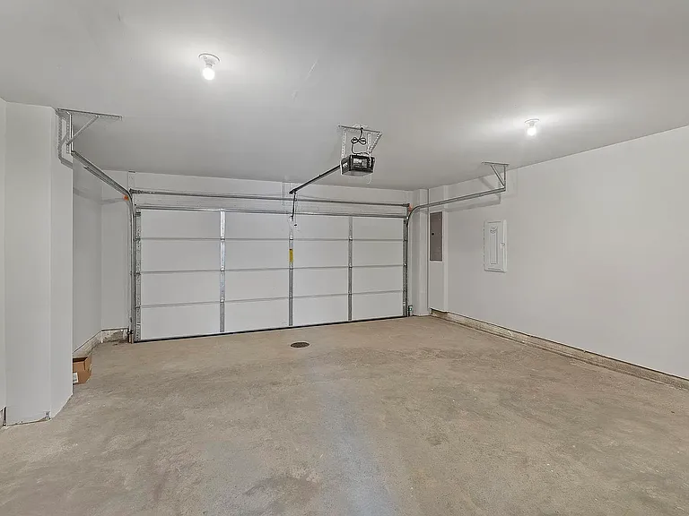 2 car garage with Electric-car charger and generous storage