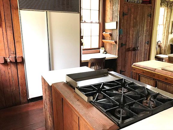 gas stove top with large refrigerator 