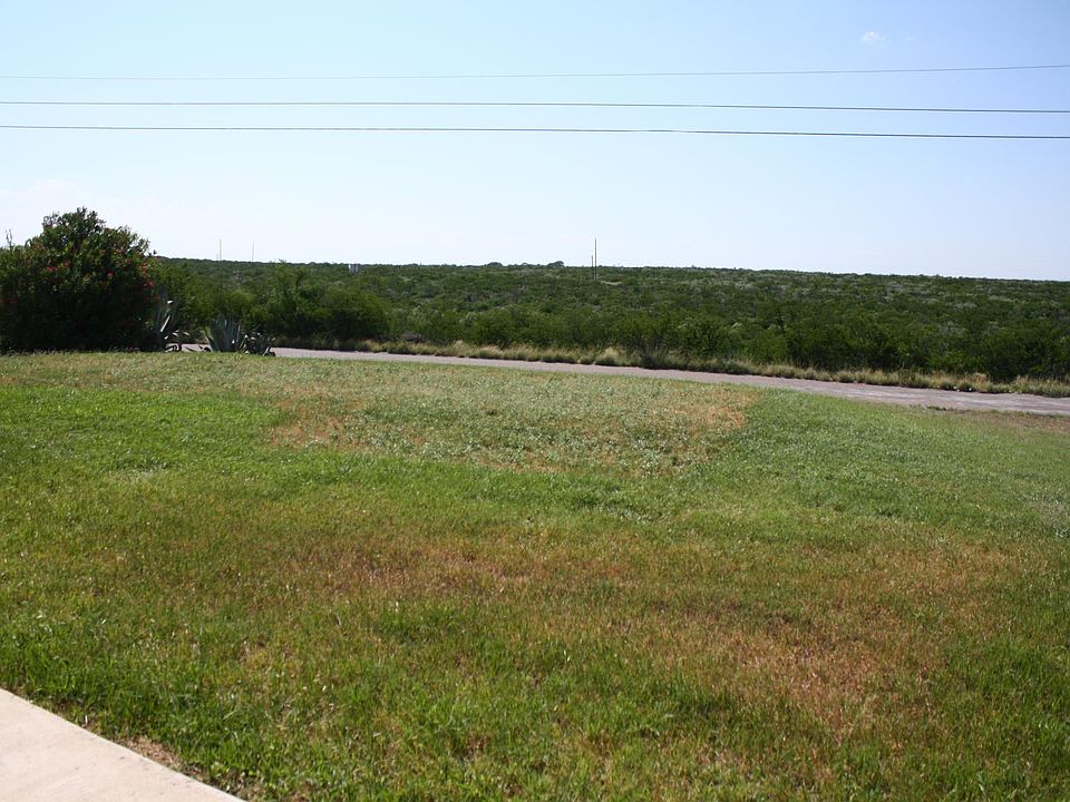 Scene along Houston Ave to southwest from triplex porch