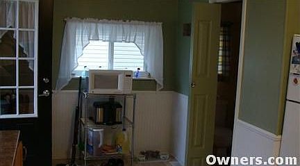 kitchen with half bath door way