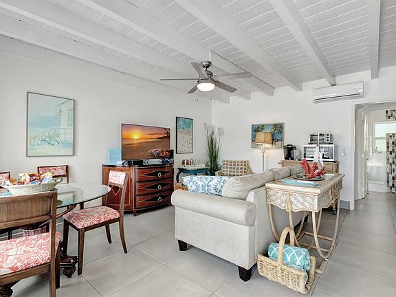 living room with dining table and chairs