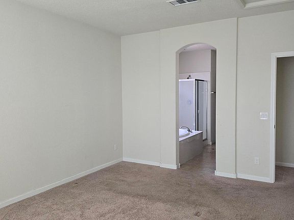 Primary suite downstairs off dining room