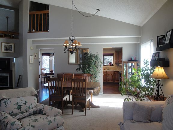 Vaulted ceilings make this living room very bright