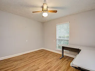 Flexible room perfect as a bedroom, home office, or study.
