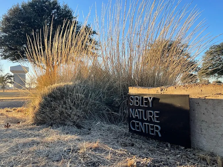 Across the street from Sibley Nature Center.