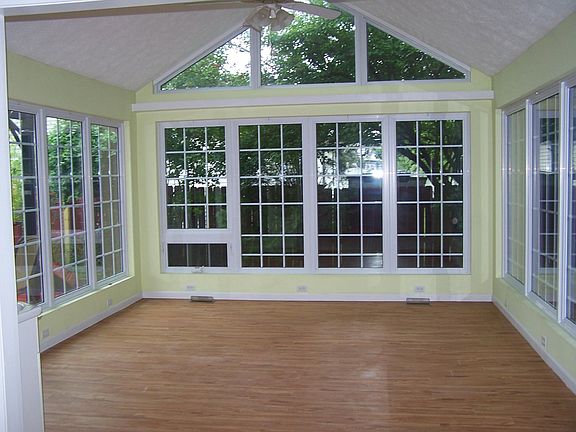 Sun room, heated, and located off of dining room and kitchen areas.