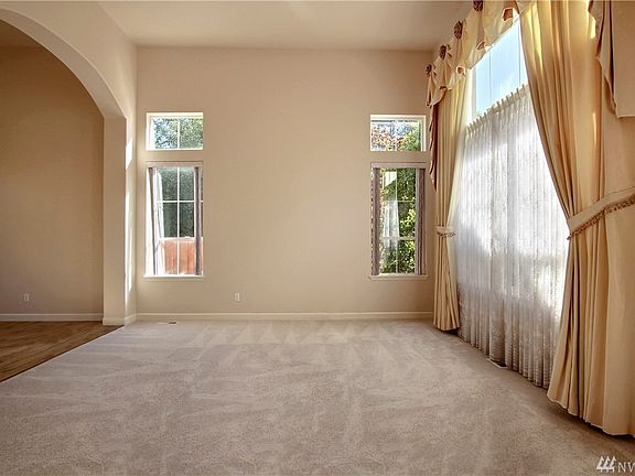 Living room with large windows that offer plenty of natural light.