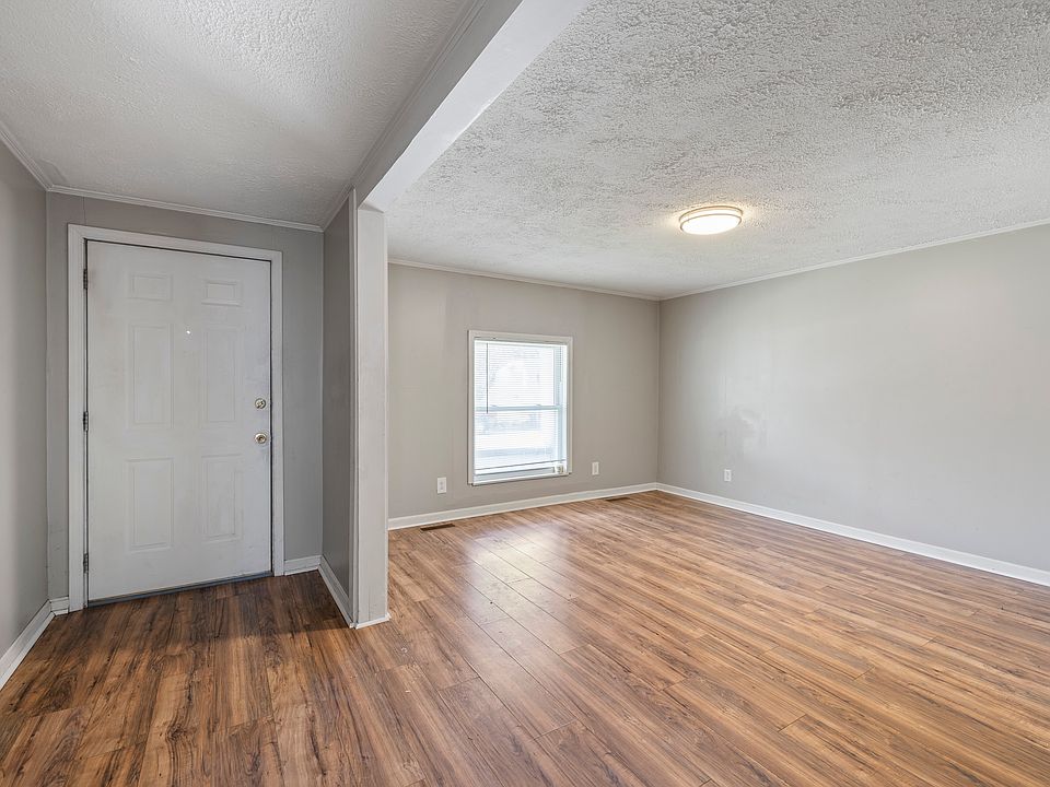 Living room with front door on left