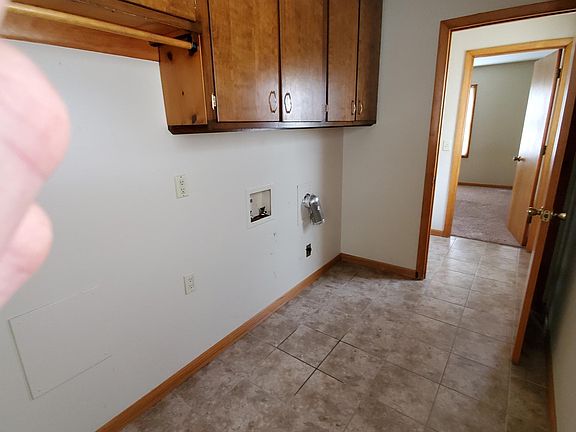 Washroom area with view into 1/2 Bath