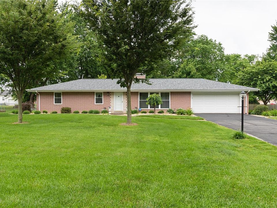 Immaculate full brick with an oversized 2 car garage and large level lot.