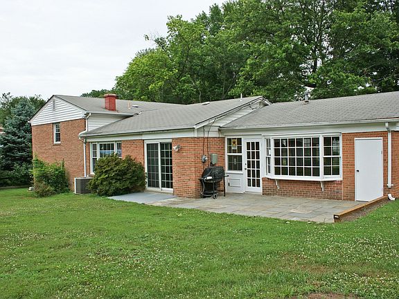 Patio and Large Partially Fenced Yard