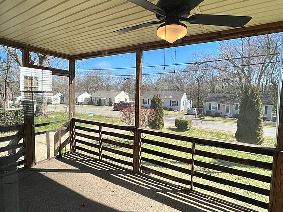 Relax or work from this lovely screened in porch