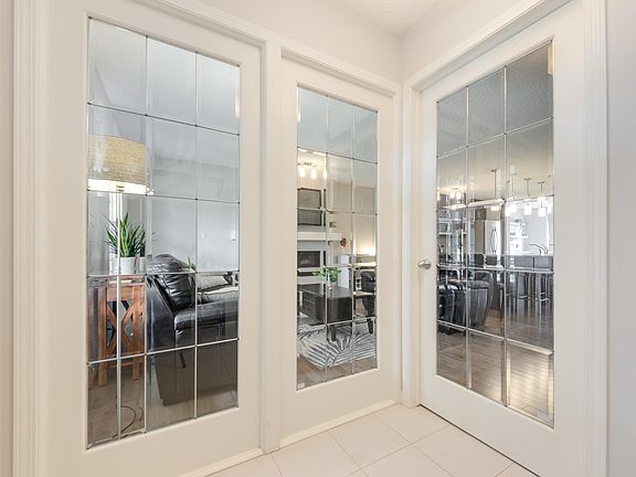 4th image of 7987 Erasmus Cres NW