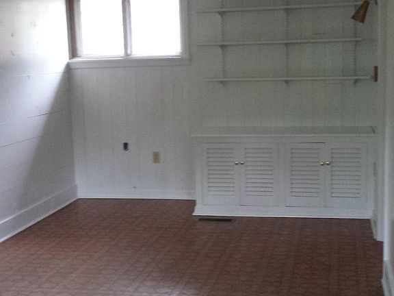 Shiplap and more storage. Room can be used as dinning, livin
