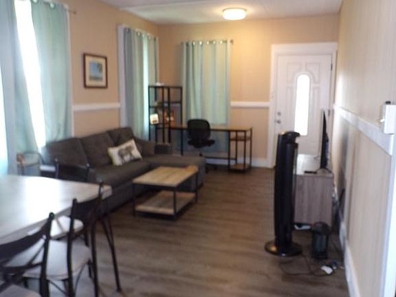 View of the living room, dinning area from kitchen.