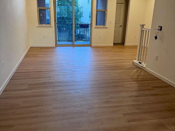 Living/Dining room with balcony