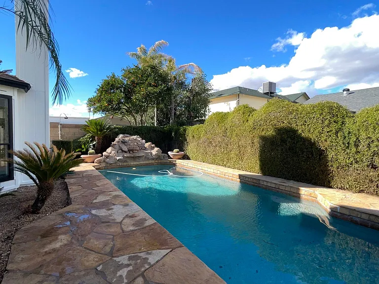 BACKYARD. Large and deep swimming pool.