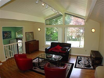living room with vaulted ceiling