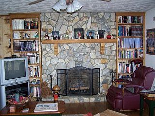 The fireplace has gas logs but can also burn wood.