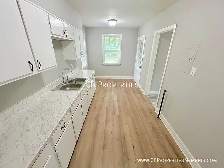 3585 Mayfair Ave — Photo 2