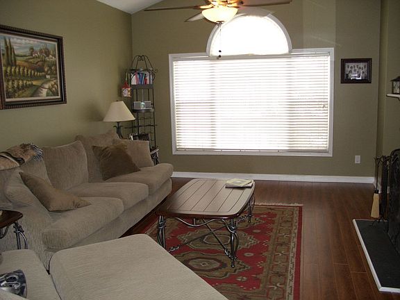 Beautiful Den with rich hardwood floors