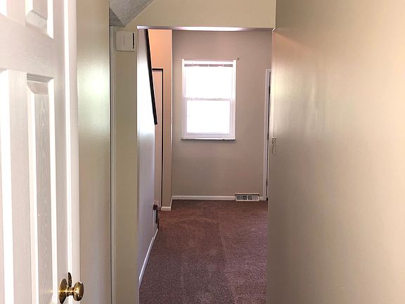 hallway from kitchen to living room