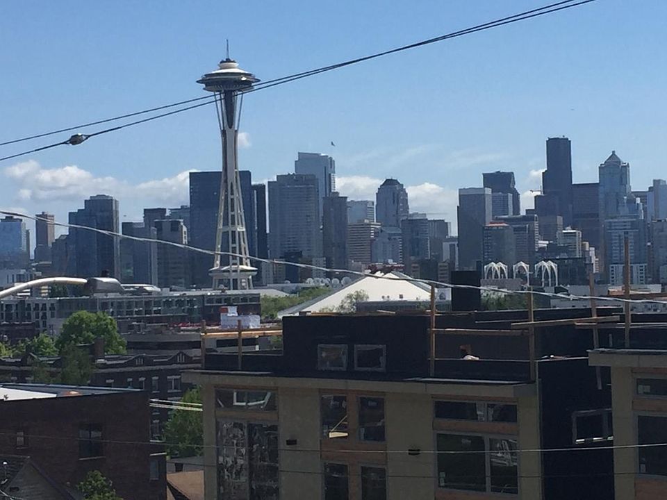 Sunny Balcony Space Needle View
