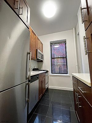 3rd image of 310 E 19th St APT 3