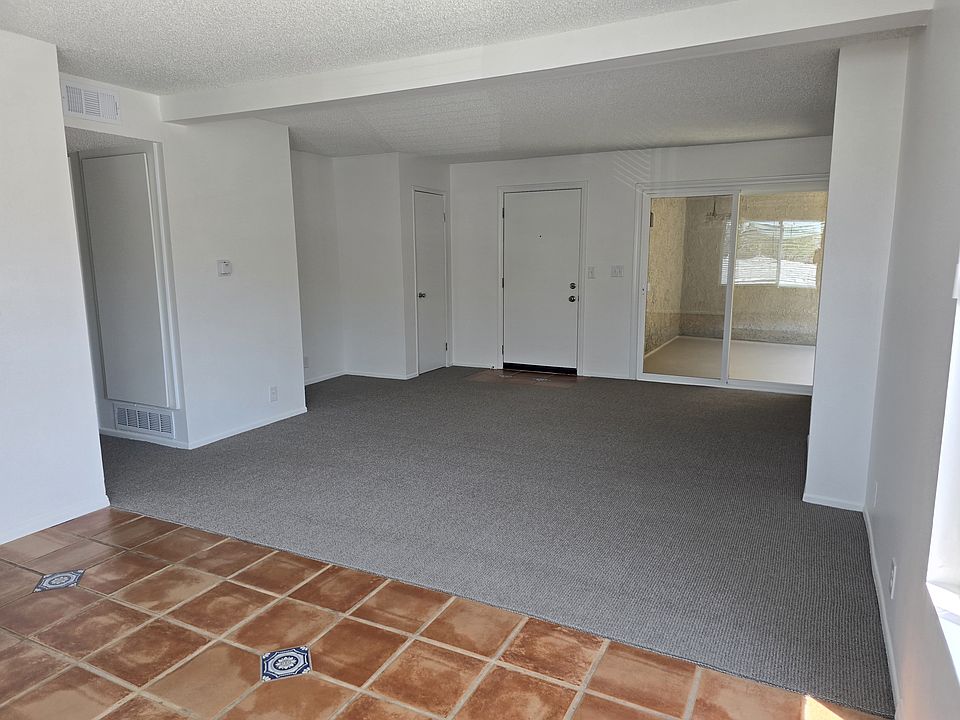 Enter apartment from door to left of slider. Private balcony off living room.