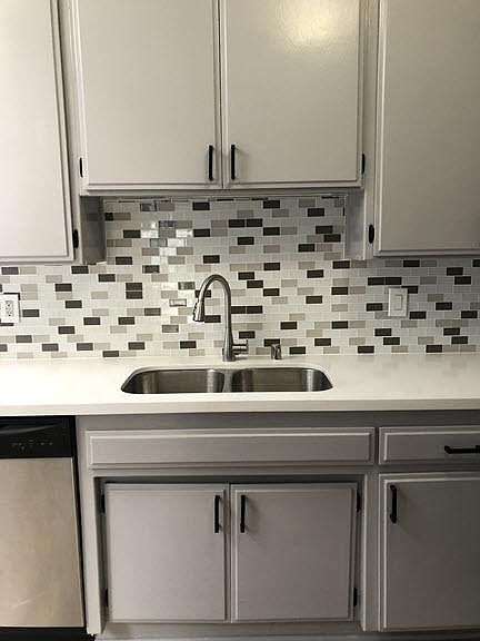 New Kitchen - new counter tops with stainless steel appliances.