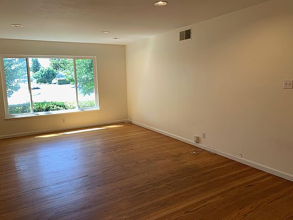 Large living room with hardwood floors.