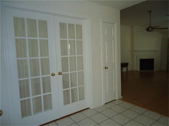 Front foyer with French doors leading to study.