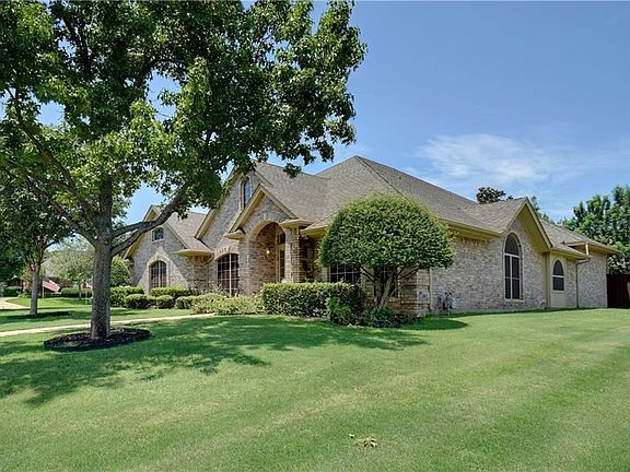 Trees and landscaped, sprinkler system.