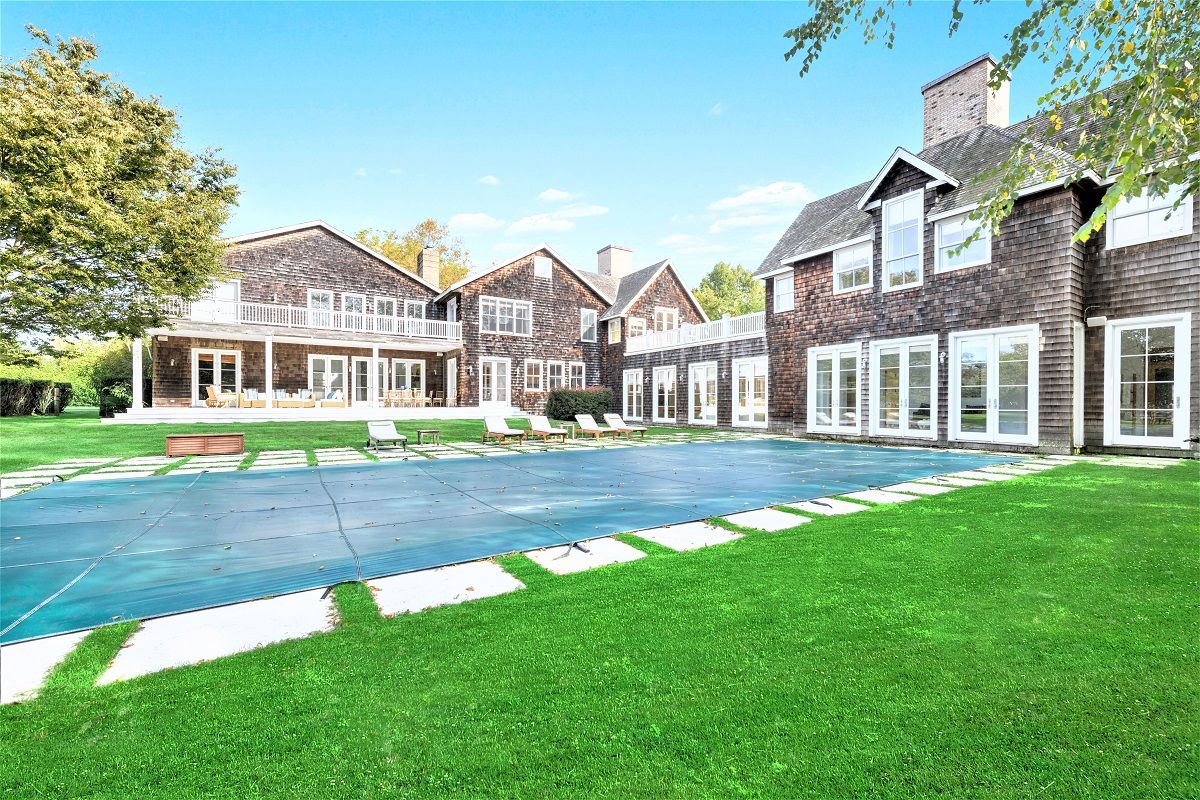  Beautiful grassy area with huge 50x20 heated gunite pool