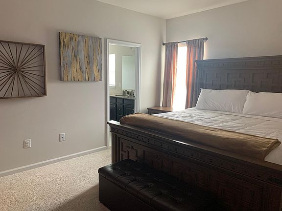 3rd floor master bedroom with king bed and reclining feature.